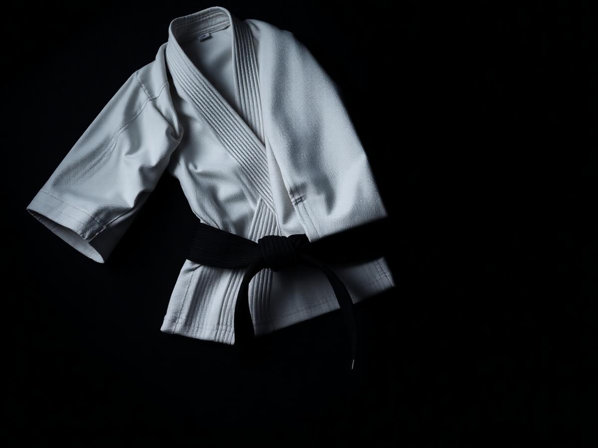 White gi with a black belt